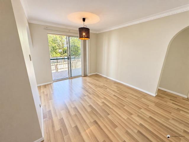 Light Filled Two Bedroom Unit with Dual Balconies & Air Conditioning