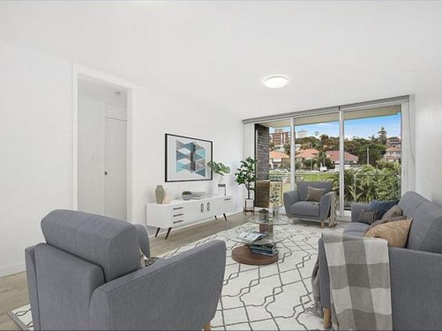 LIGHT FILLED UPDATED APARTMENT IN COASTAL LOCATION