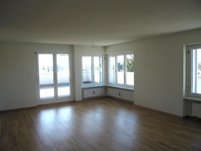 Light flooded attic apartment