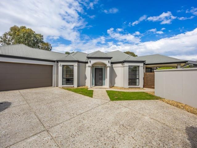 Light, Low Maintenance Family Living Close to the Beach