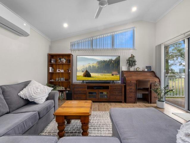 LightFilled Home with Bush Outlook