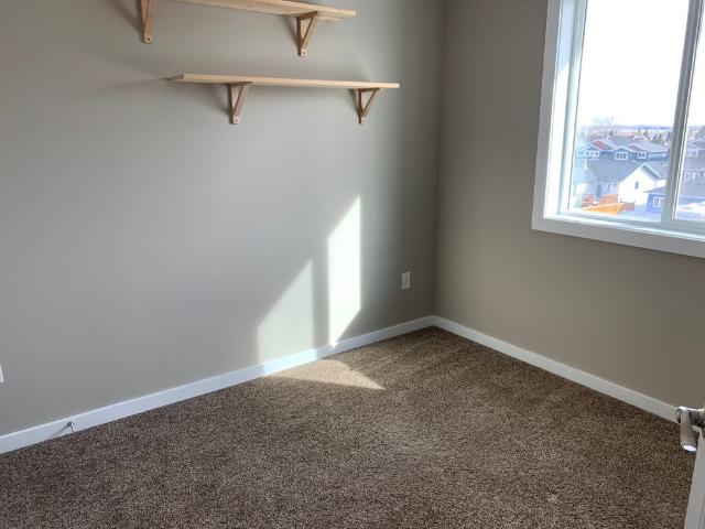 LIKE NEW 3 BEDROOM WITH HEATED GARAGE SMALL PET FRIENDLY