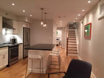 Little Italy Toronto Furnished Apartment Rental by College and Ossington Lovely 1 Bedroom Garden Suite with Bi Weekly Maid Service and 8 ft High Ceilings