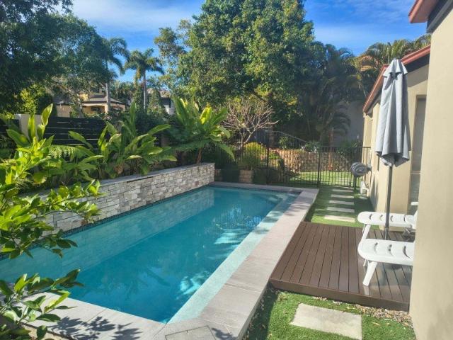 Live The Ultimate Robina Lifestyle Stylish 4 bedroom +Study Home With Sparkling Pool, Surrounded By Parks