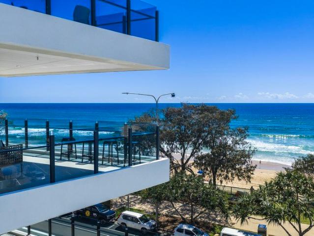 Live the Coastal Dream in a Boutique Absolute Beachfront Oasis