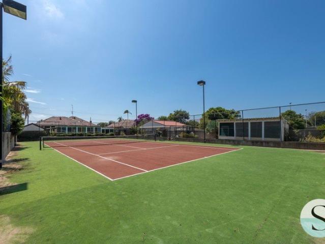 Live Your Own Personal Resort Tennis Court, Swimming Pool, Backing Onto Oval, Single Level Solid Home or Use the DA Approval for 6 Townhouses