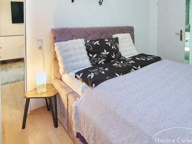 Living comfort near the city park with use of the garden and own duplex underground parking space