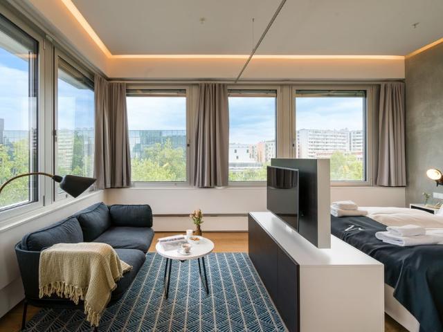Living with a View: Charming Accommodation on the 10th Floor of Philips Haus Vienna, Vienna Amsterdam Apartments for Rent