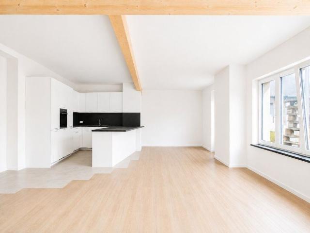 Living with history: Unique 4.5 room maisonette apartment in a former bowling alley first rental
