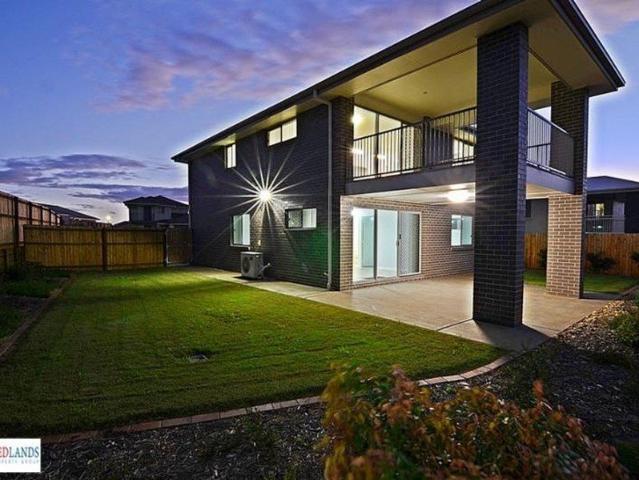 LIVING ZONES ACROSS 2 LEVELS AIR CONDITIONED 2 ENSUITES