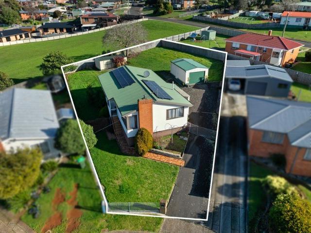 LOOKING FOR A LARGE YARD & A SHED?
