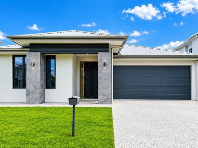 Looking for a stylish and comfortable family home almost brand new?