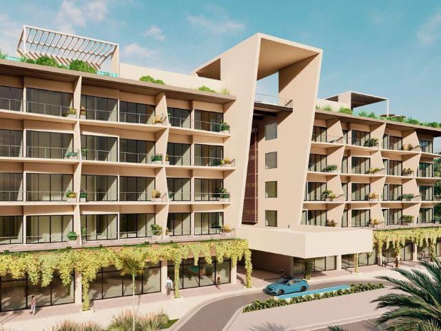 Local comercial a 3 minutos de la playa, en edificio de condominios, pre constru