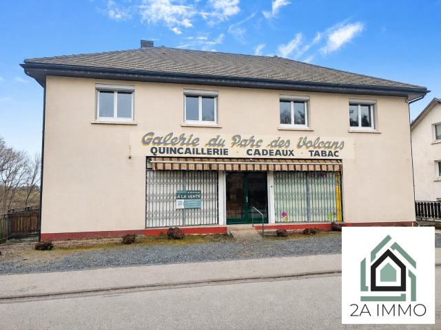 Local commercial avec appartement T4 et terrain constructibl. 230m² Olby