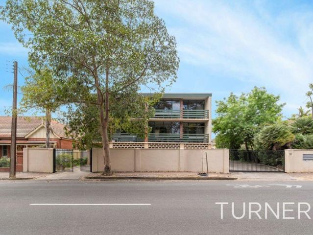 Located in this Beautiful Tree Lined Street with Large Balcony