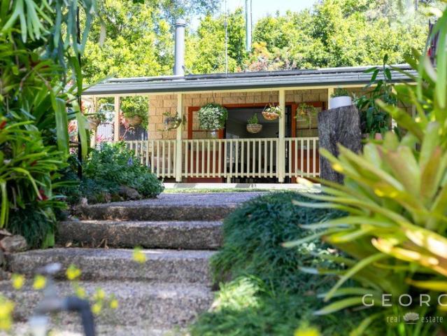Location, Charm, Presentation + Village Convenience!