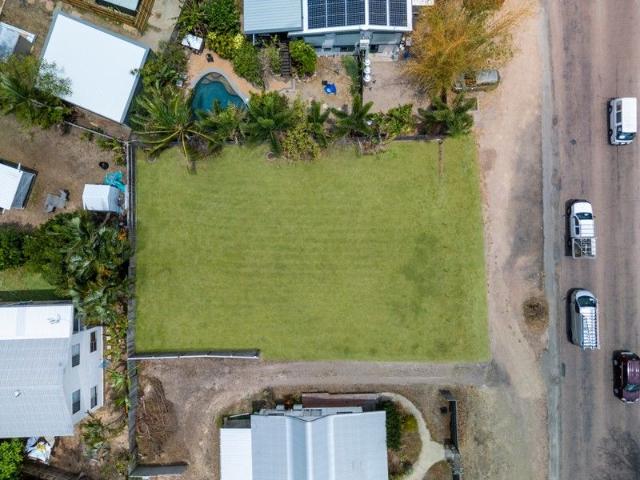 Location, Location! Central Nelly Bay Land with Endless Possibilities