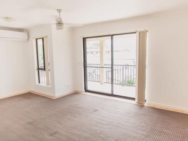LOCATION LOCATION. SECURE 2 BED 2 BATH 2 CAR + STORAGE CAGE