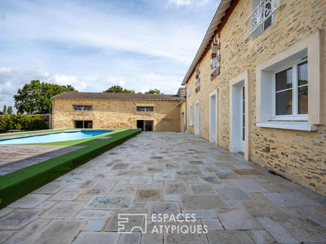 Location Maison familiale d'exception avec piscine chauffée et grandes dépendances à Carquefou Gravaudière à CARQUEFOU 222 m2 Espaces Atypiques Nantes