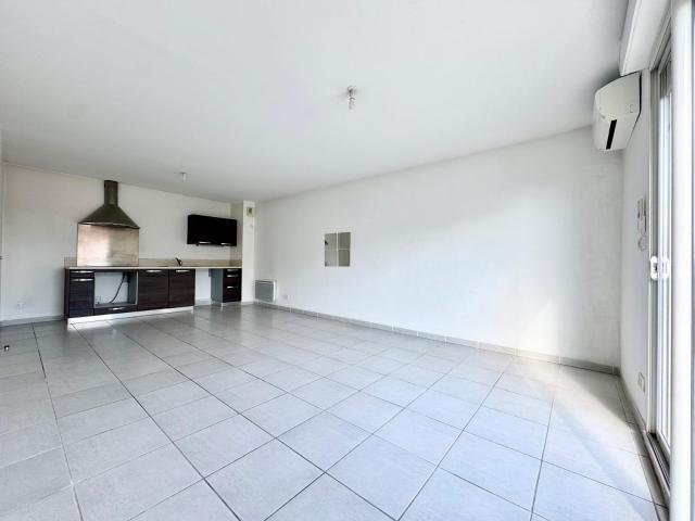 Location NIMES / DHUODA T3 AVEC CLIMATISATION, BALCON ET PARKING | Tourdiat Immobilier
