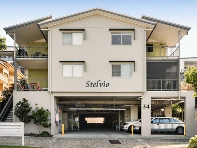 Lock & Leave Convenience with Rare Courtyard Offering