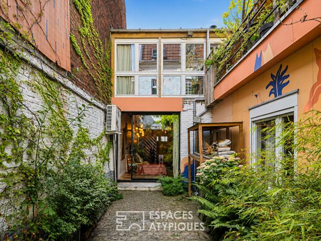 Loft avec terrasse paysagée dans une ancienne maison boutique ouvrière