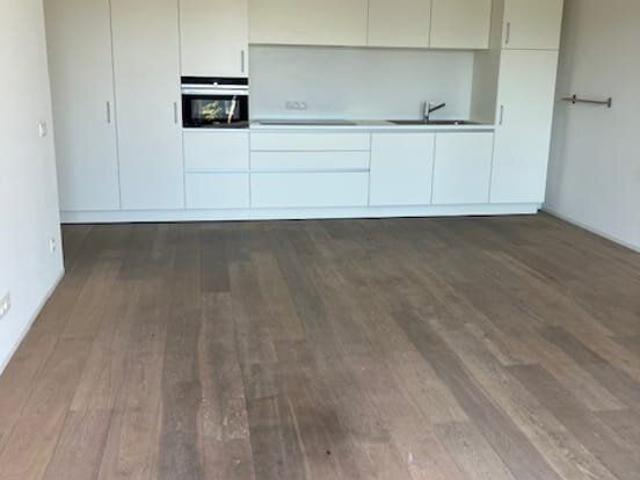 Loft appartement met 1 slaapkamer, zonneterras en parking!