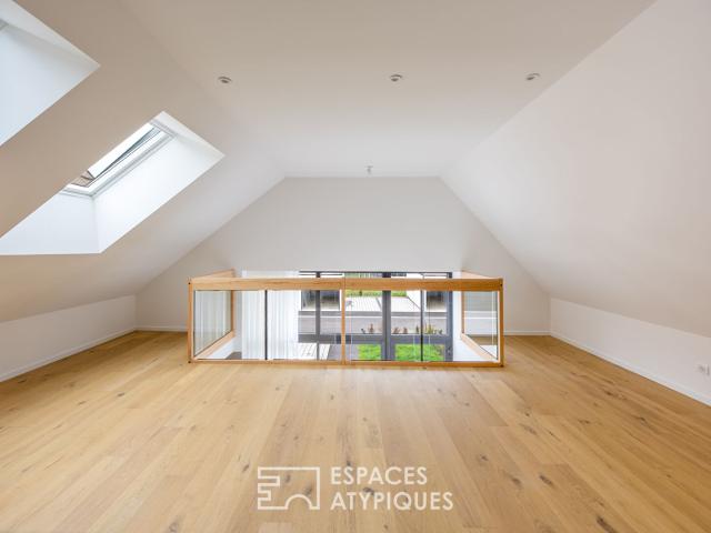 Loft contemporain en duplex et sa terrasse dans une ancienne friche industrielle