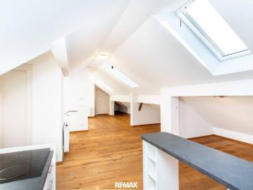 Loft Wohnung mit Lift Direktzugang & Eigengarten in ruhiger Stadtrandlage