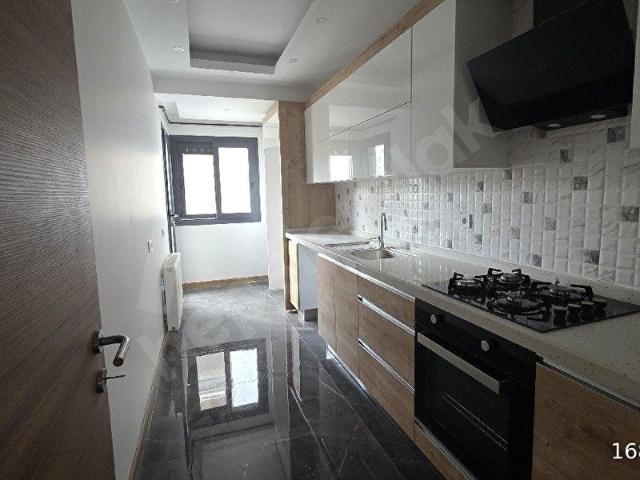 Loftdan İzmir Çiğli Esentepe'de Sıfır, Deniz Manzaralı 2+1 Daireler Satılık