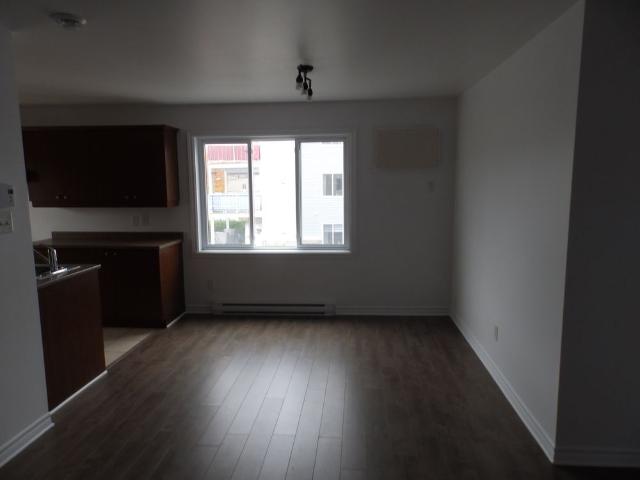 Logement 4 1/2 Style Condo1étage Triplex