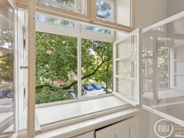 Loggia ins Grüne: 1,5 Zimmer Altbau mit Wohnküche und Tageslichtbad in Reinickendorf