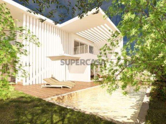 Lote com projeto aprovado para construção de Moradia com piscina