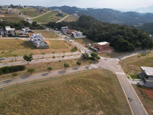Lote em condomínio para venda, 489m²
