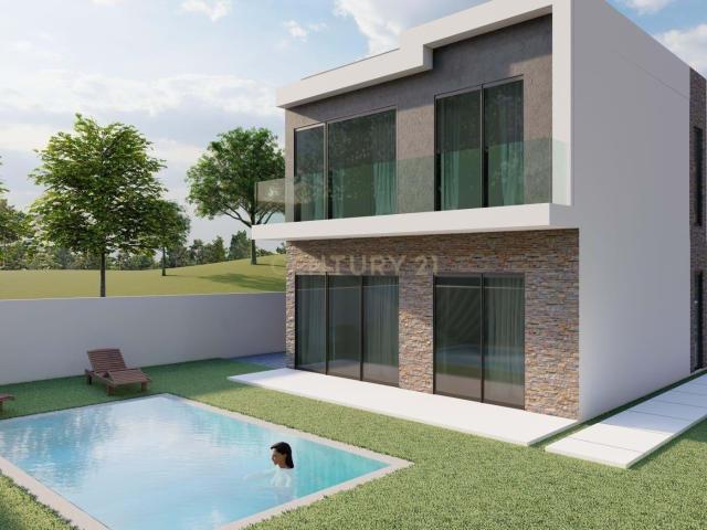 Lote Urbano de 331m² com PROJETO JÁ NA CÂMARA – Próximo Mercado Charneca de Caparica
