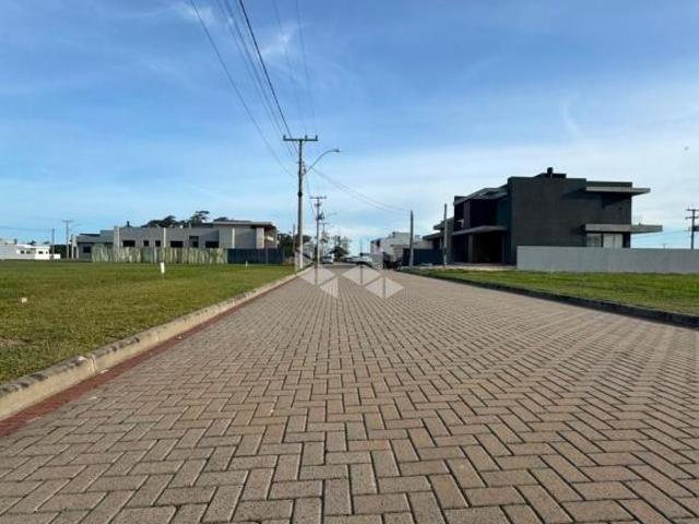 Lote 10,5 x 24 m com Frente Oeste no Bairro Planejado Santorini Xangri Lá/RS