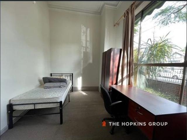 LOVELY AND WELL LOCATED ROOMING HOUSE