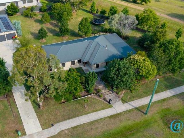 Lovely, Large, Modern Brick Home on Over Half an Acre!