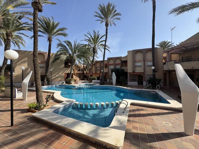 Lovely south facing ground floor apartment with parking and pool
