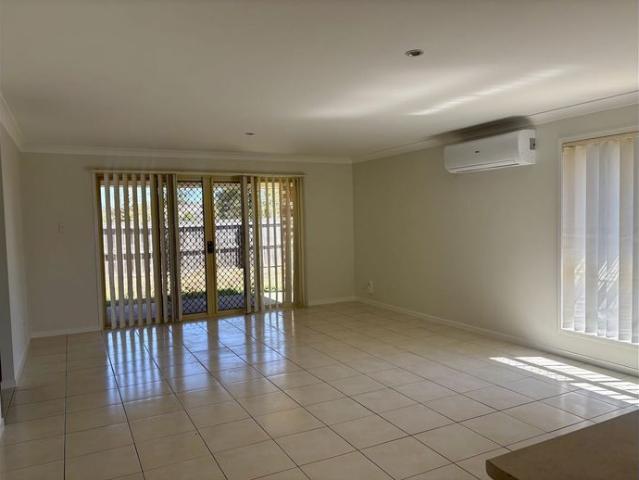 Lovely presented lowset 4 bedroom brick home