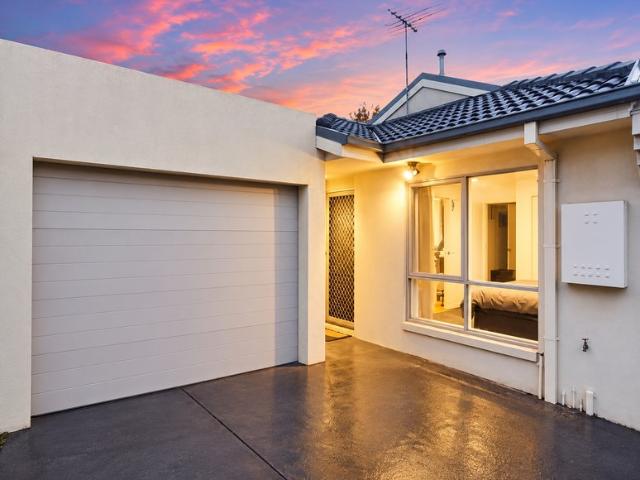 LOVELY TWO BEDROOM HOME WITH SPACIOUS COURTAYRD!