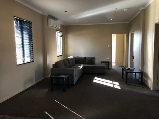 Low maintenance 3 bedroom unit close to shops and hospital