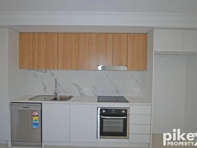 Low Maintenance 2 Bedroom Living in Peaceful Logan Reserve