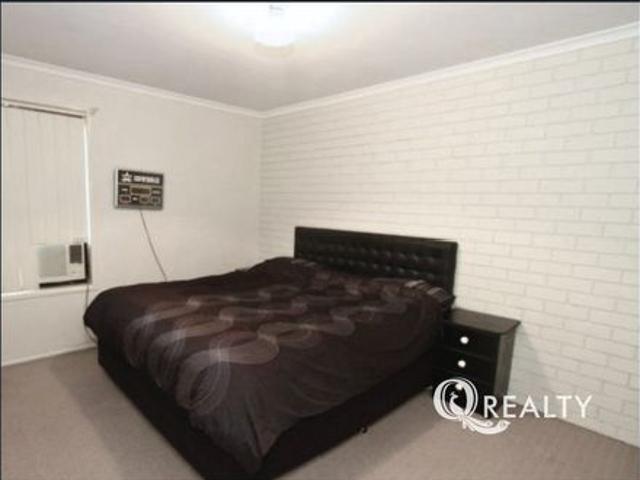 Low Maintenance 2 Bedroom Unit with Parking