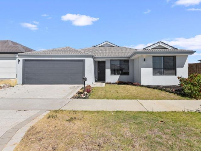 Low maintenance 4 bedroom 2 bathroom home in the heart of Catalina Estate