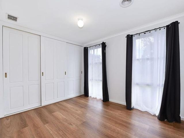 Low Maintenance Comfort with an Enormous Backyard!