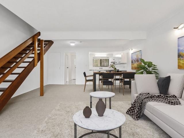 Low Maintenance & Convenient Unit in a Fantastic Location!