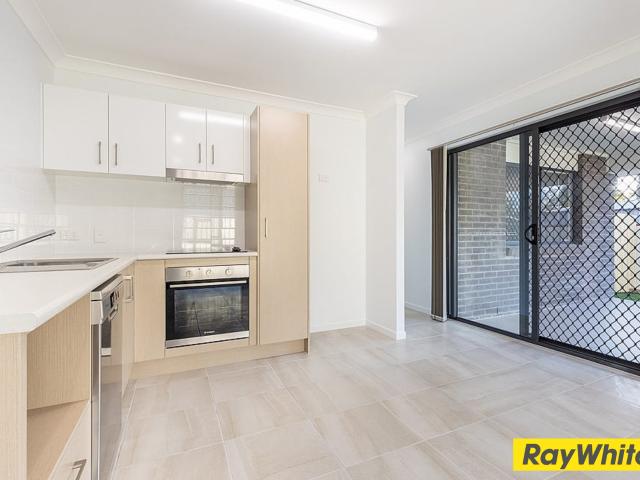 Low Maintenance & Convenient Unit in a Fantastic Location!