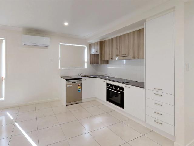 Low Maintenance & Convenient Unit in a Fantastic Location!