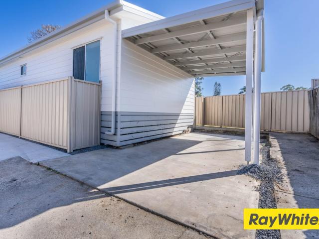 Low Maintenance & Convenient Unit in a Fantastic Location!